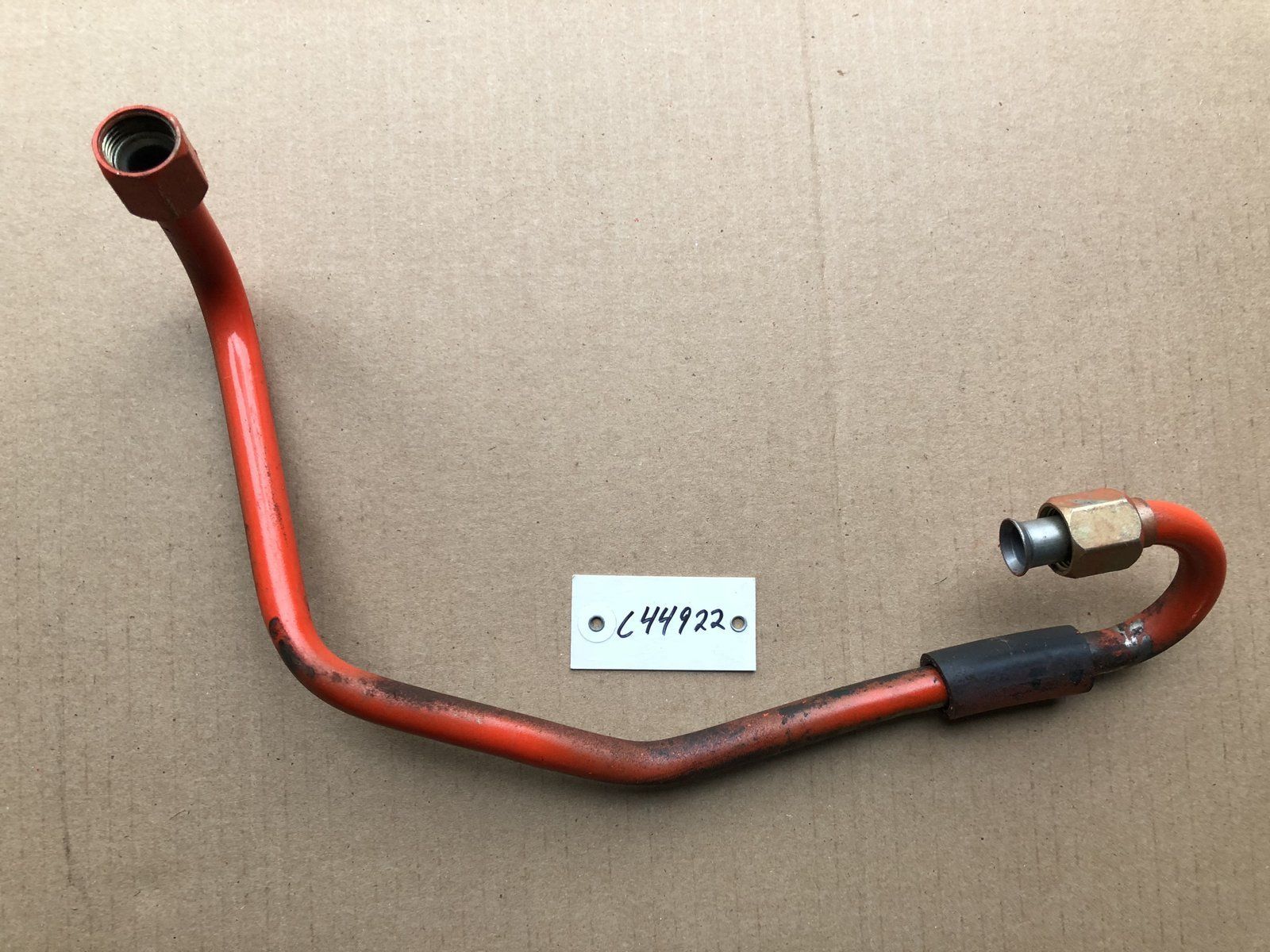 C44922 USED TUBE TO OUT/T.C. VALVE "IN" - Ingersoll/Case Tractor Part