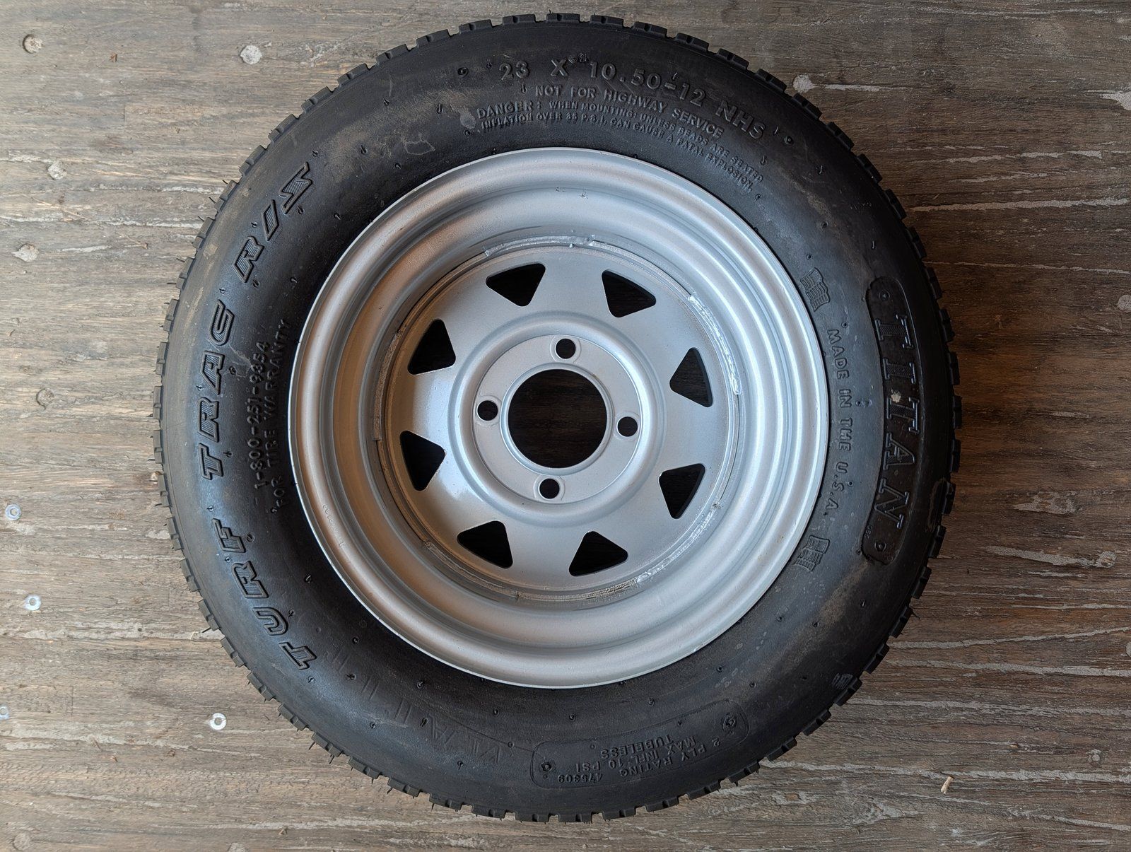 C48057 WHEEL & TIRE 316LGT 318GT 23x10.5-12 4-BOLT - Ingersoll/Case Tractor Part