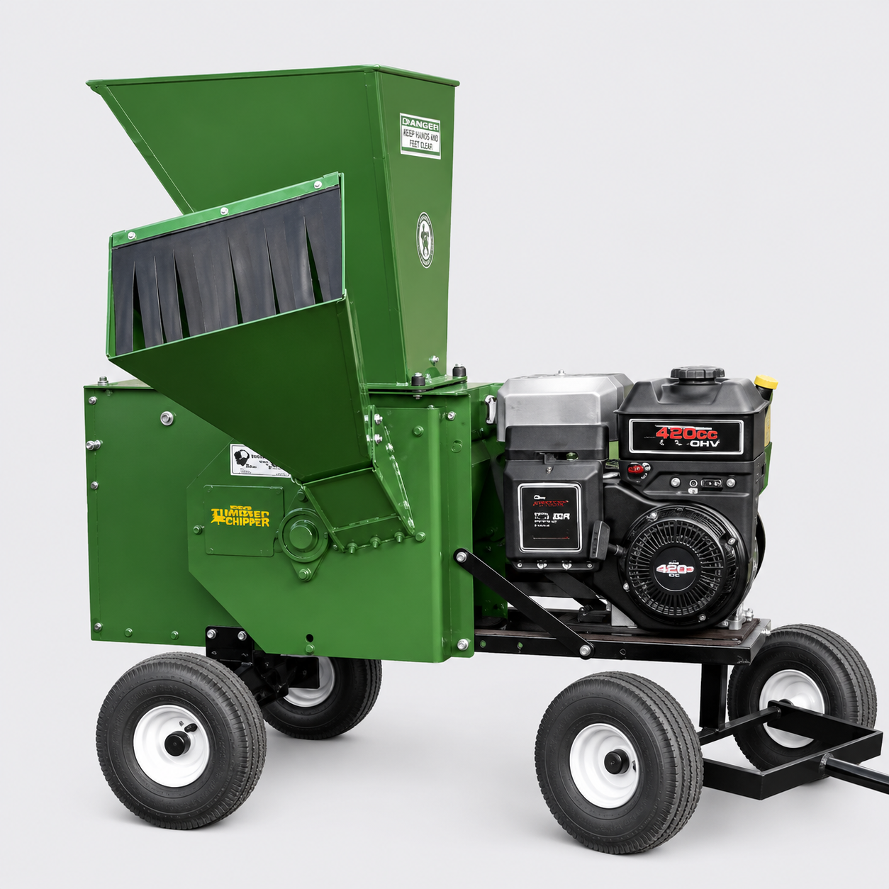 Green gas-powered wood chipper on wheels with black engine and chute.