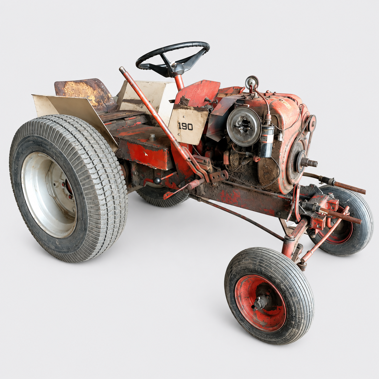 Rusty homemade tractor with large rear tire and smaller front wheel on a white background