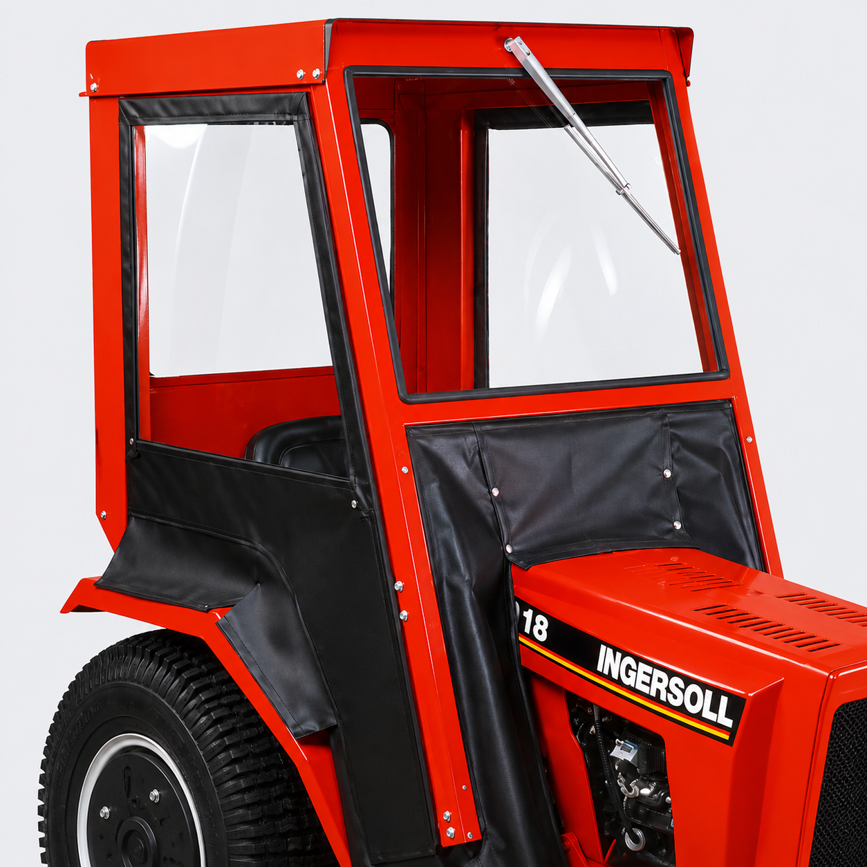 Red enclosed mini tractor with black wheels and red hood on a white background