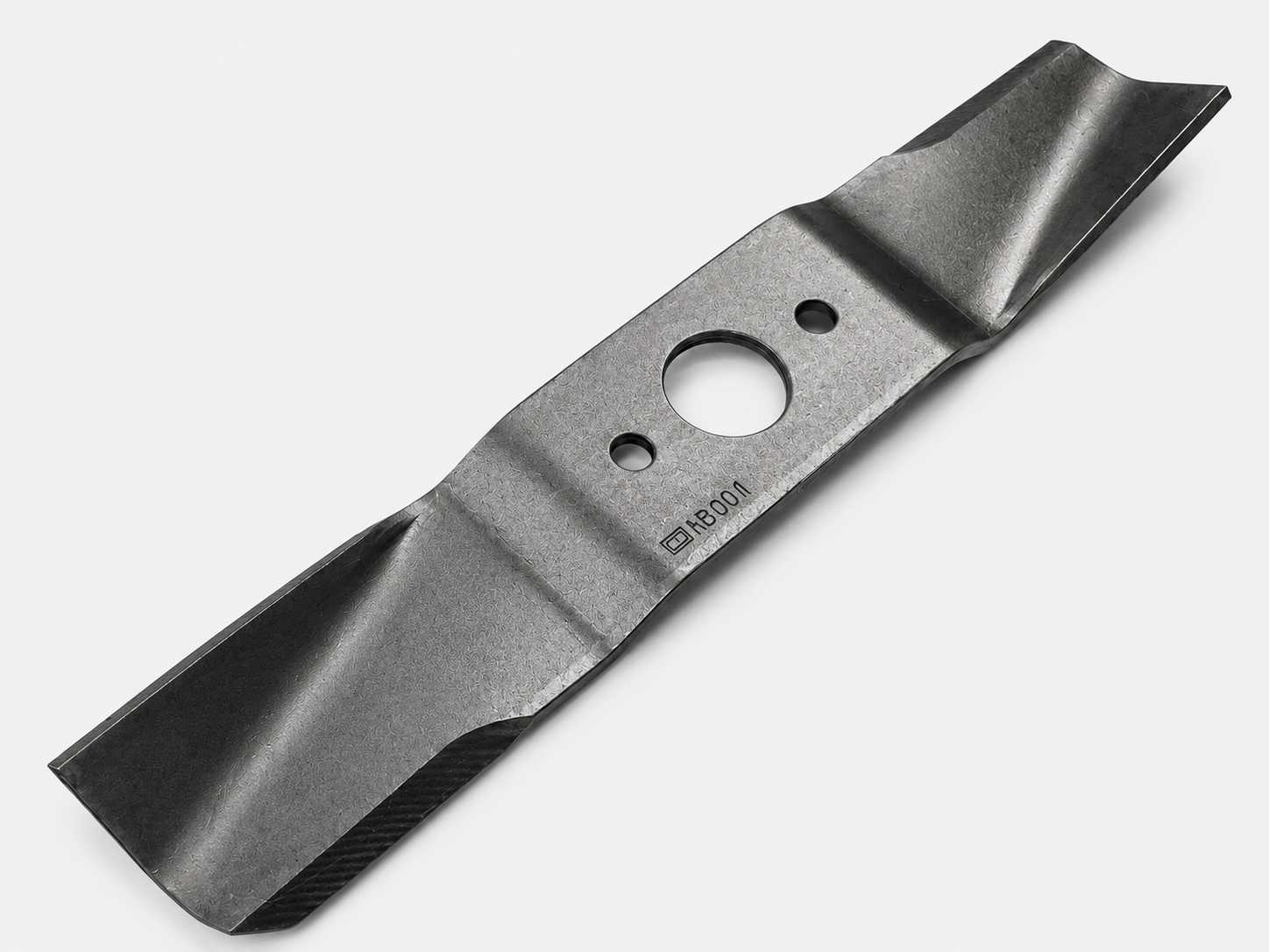 Black metal mower blade with a center hole, shown on a white background
