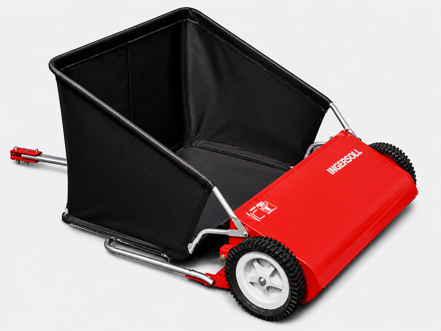 Red lawn sweeper with black collection bag and white wheels on a plain background