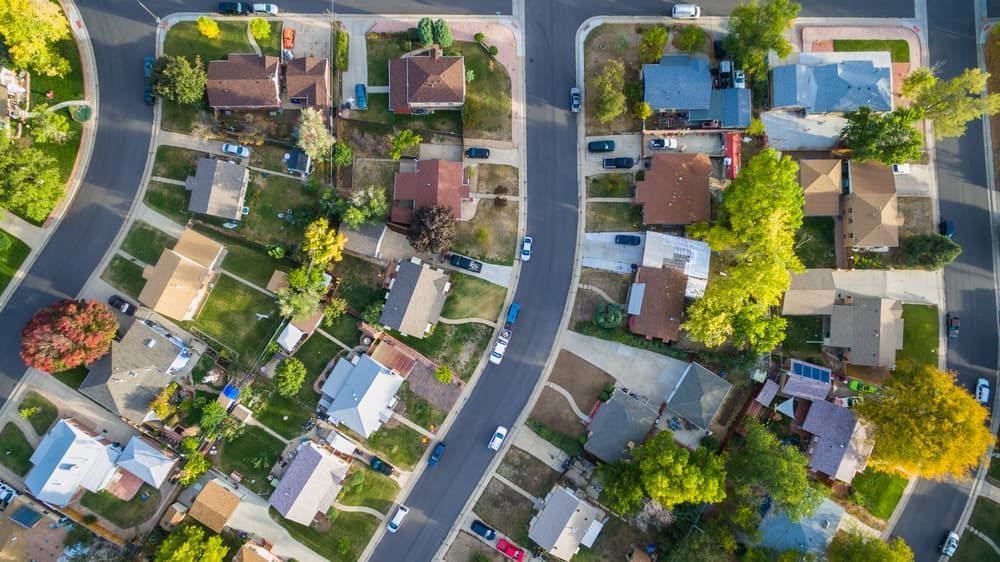 Aerial View of a Suburban Neighborhood With Houses — Jamac Cleaning Services in Cardiff, NSW