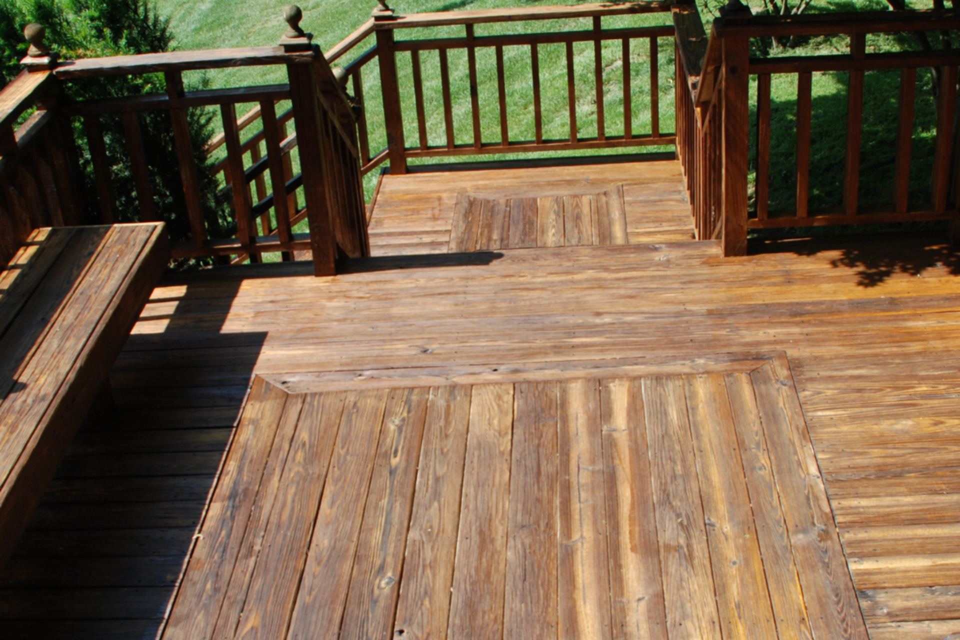 Natural brown stained wood deck boards and railings