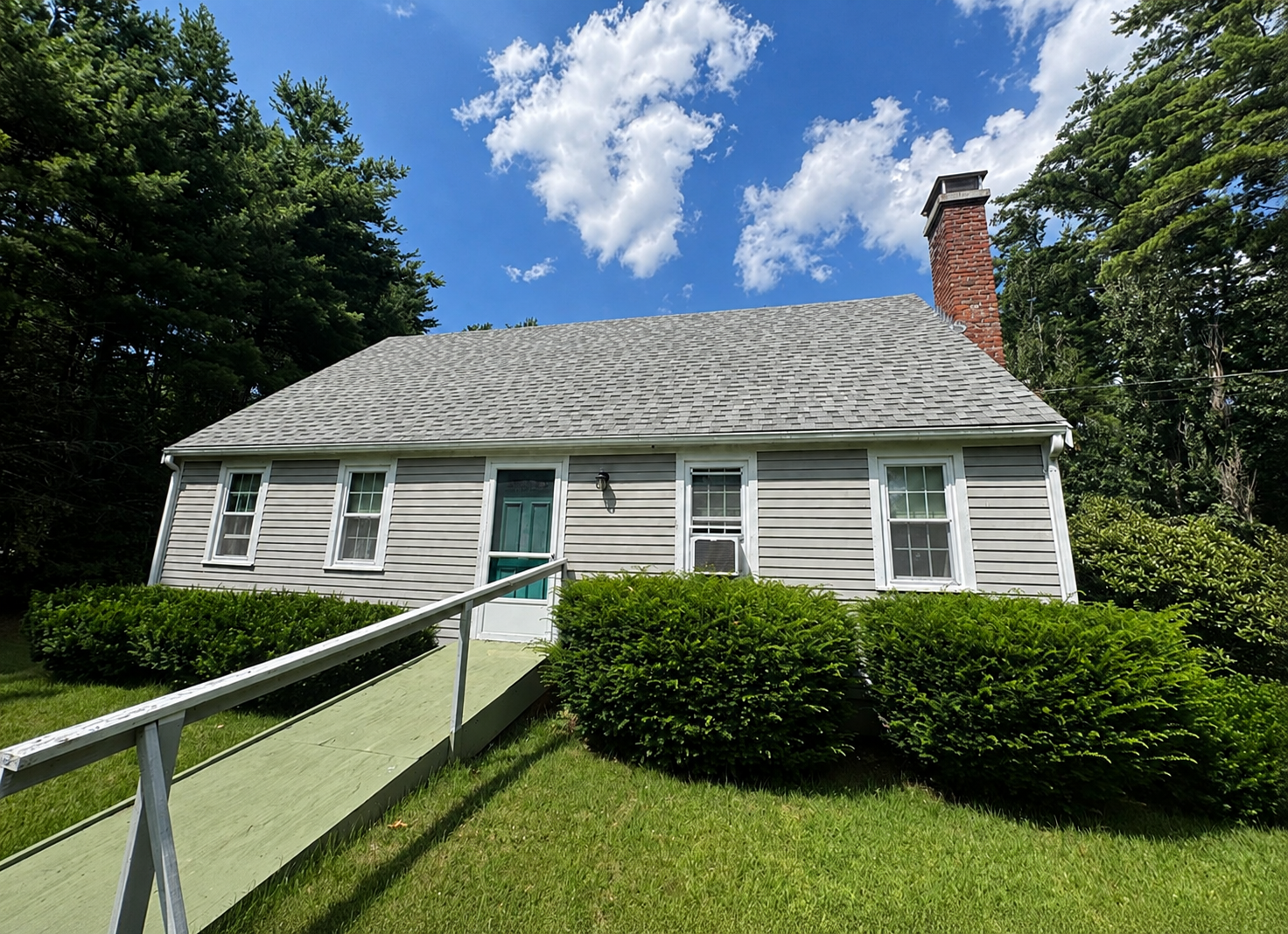 Exterior house painting completed by PTG Painting in Rochester, MA
