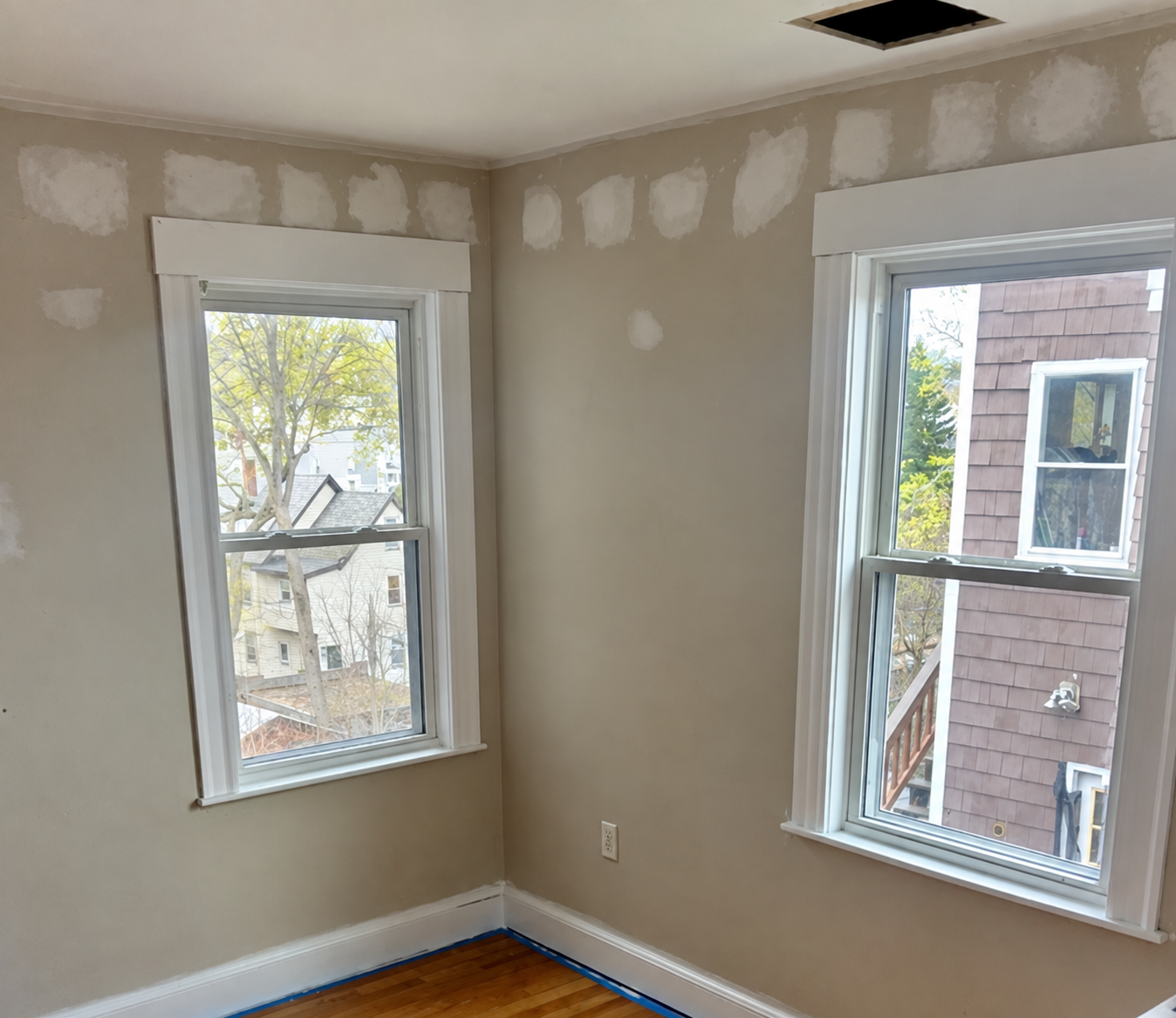 Patched walls being prepared before interior painting in South Shore, Massachusetts