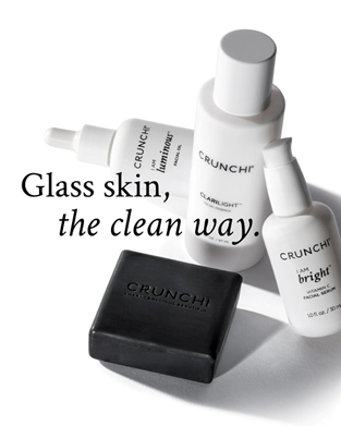 Three Crunchi skincare products and a black cleansing bar are arranged together, with the text 