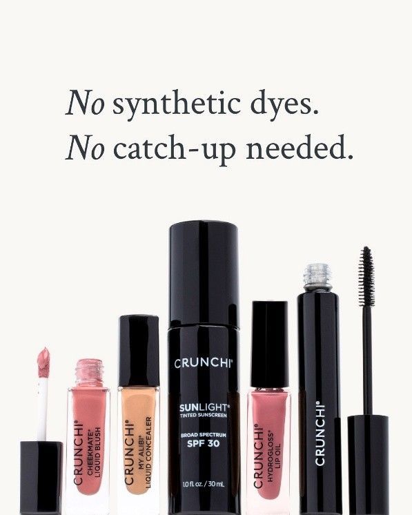 A lipstick , eye shadow , and blush are sitting next to each other on a white background.
