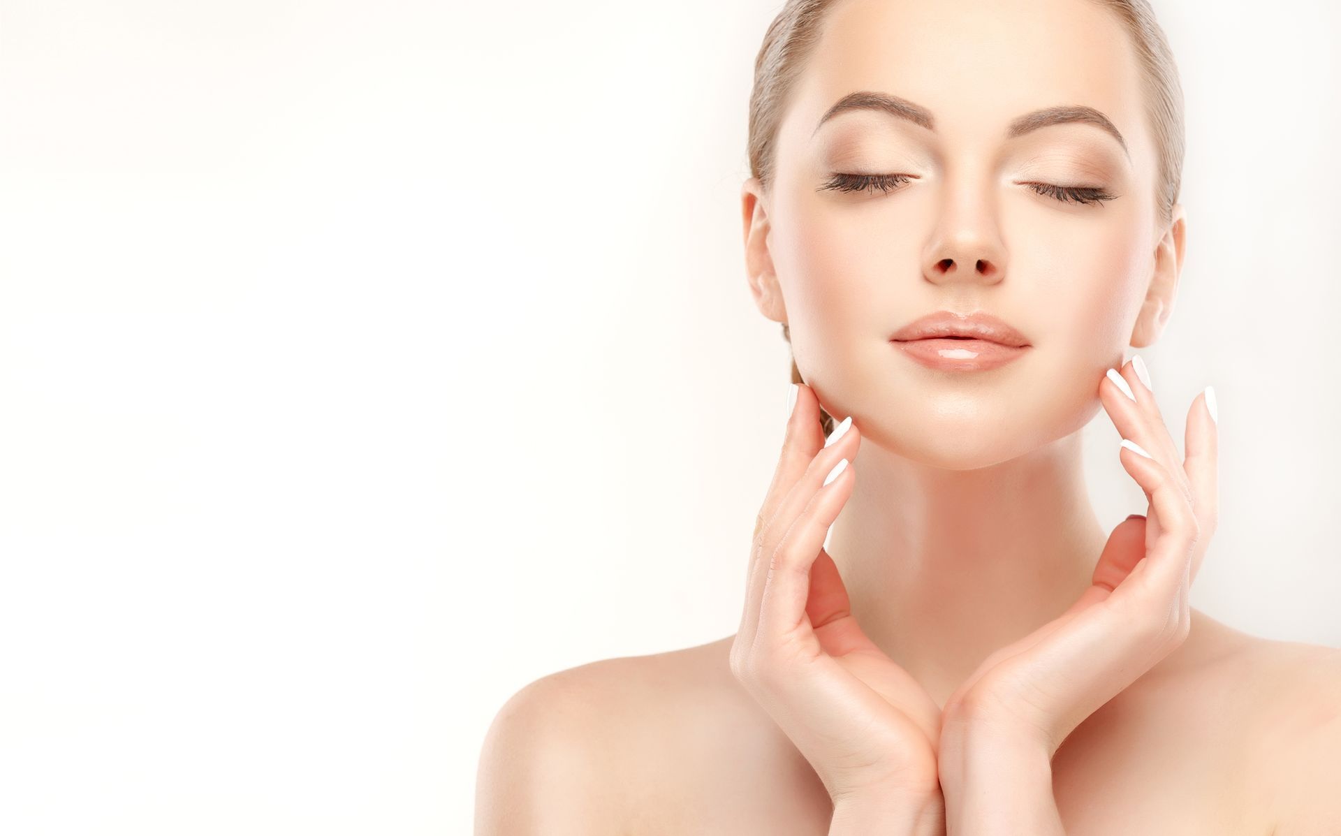 beautiful woman with fingertips touching her face