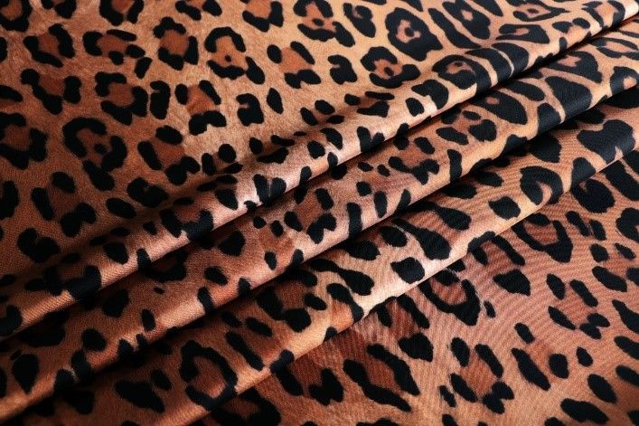 A close up of a piece of leopard print fabric