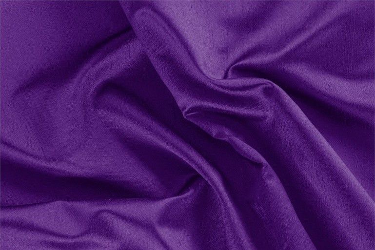 A close up of a piece of purple fabric.