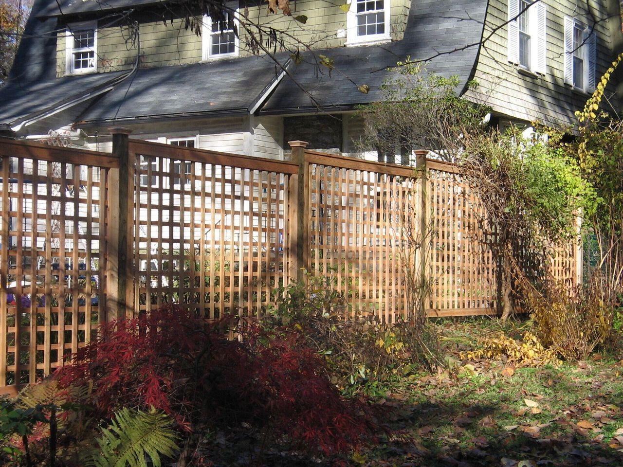 View Of Framed Panel Beside Brown House — Hatboro, PA — Main Street Fence