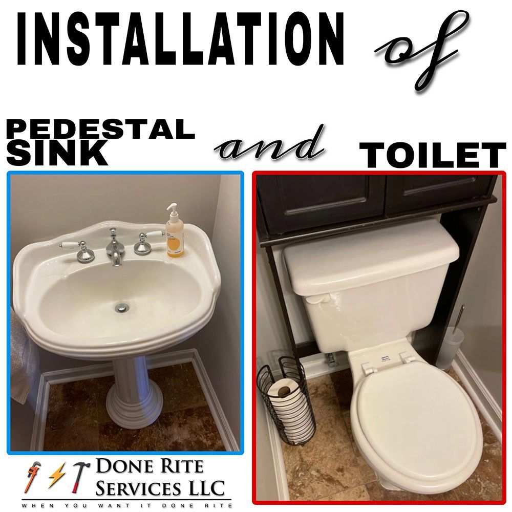 A pedestal sink and toilet are being installed in a bathroom.