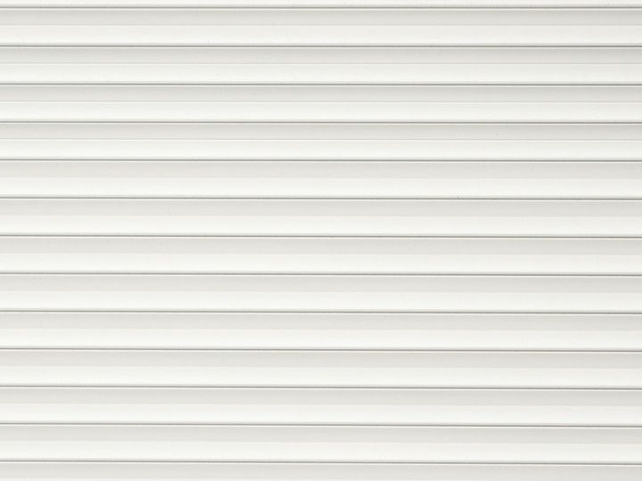 Horizontal beige and white striped textured background pattern