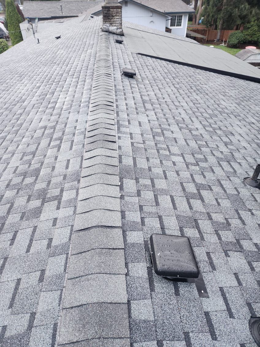 Brand New roof installation by Charlie Roofing. A roofing contractor in Olympia Washington. Call 360-485-9732 for a free quote today!