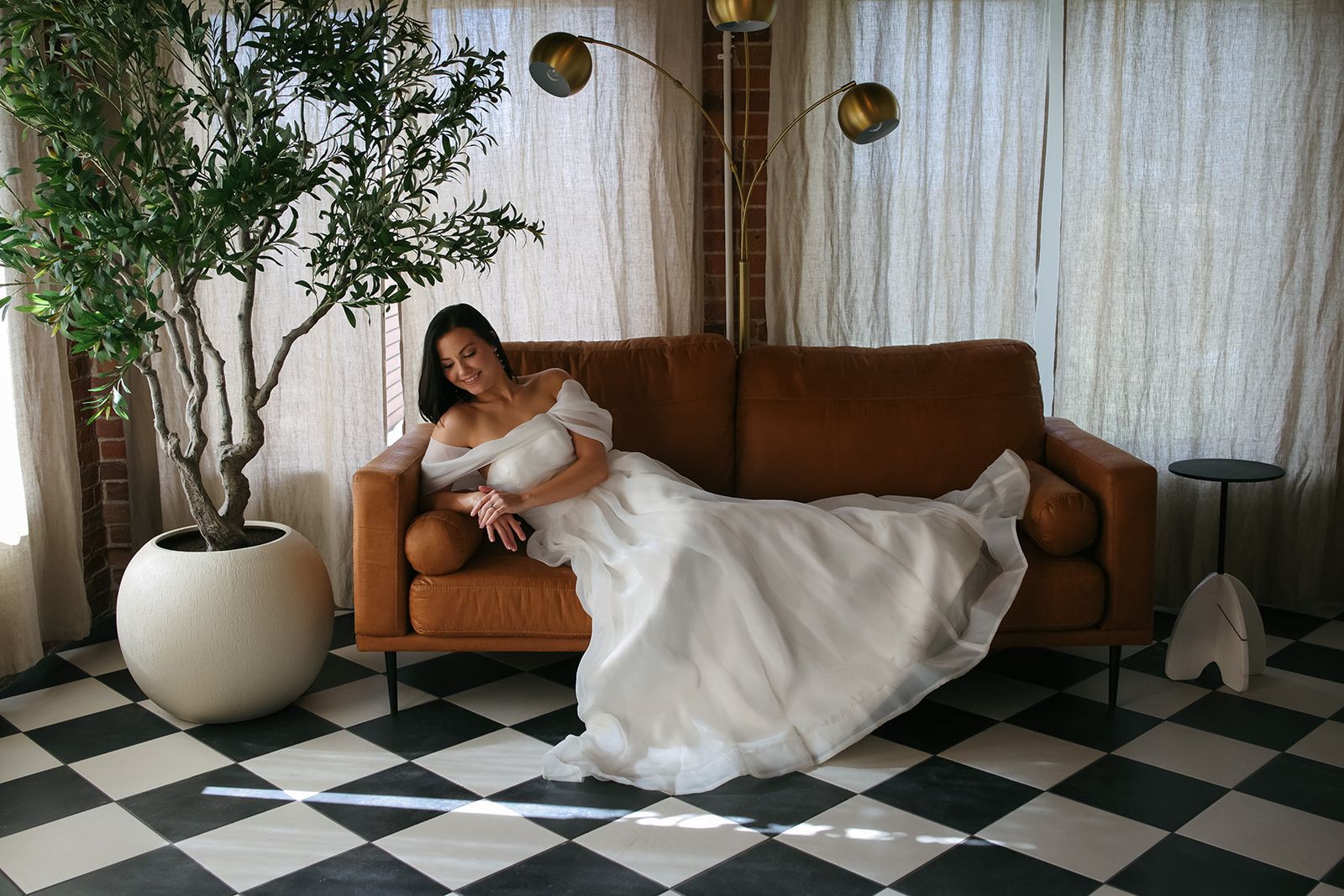 Bride resting in private suite at Bestow Events in Longmont, CO.