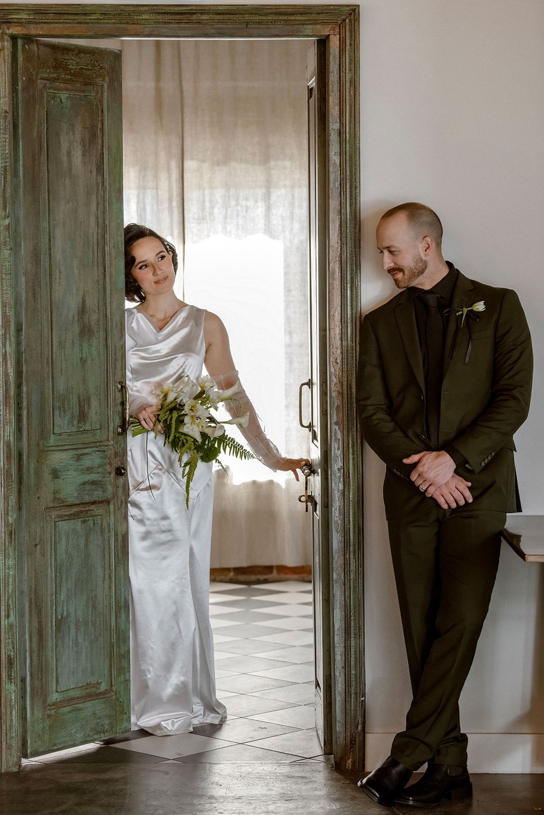 Bride and groom posing for styled photoshoot at Bestow Events in Longmont, CO.