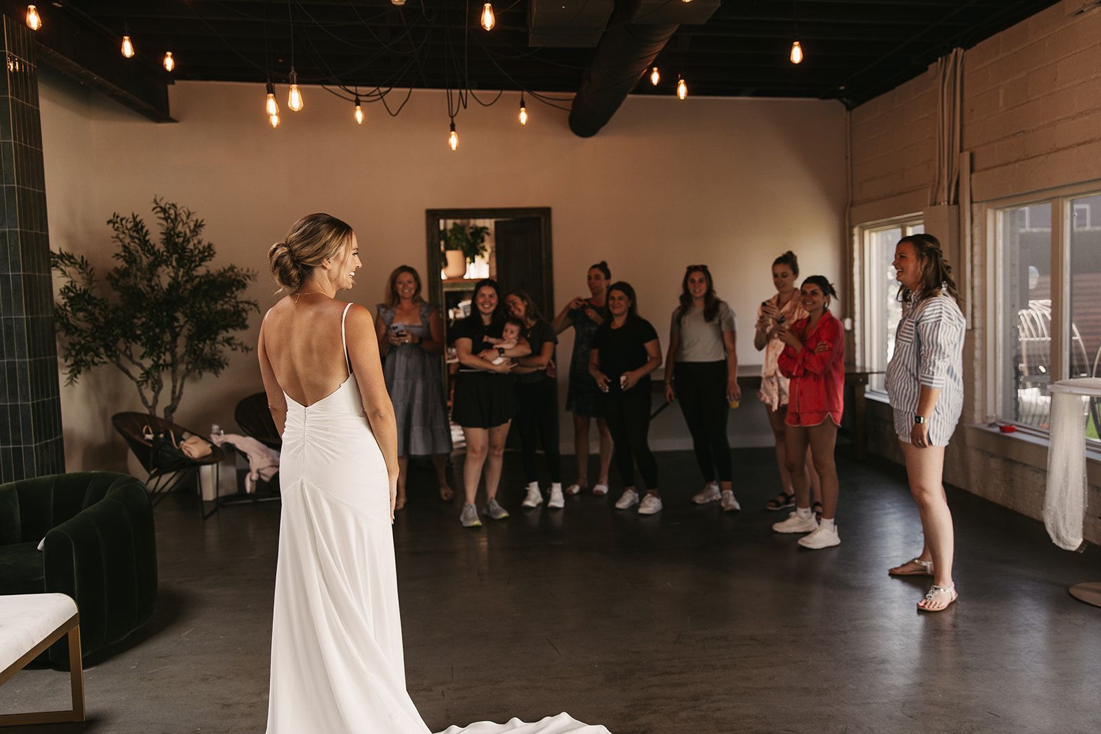 Bride and her friends sharing a first look at Bestow Events in Longmont, CO.
