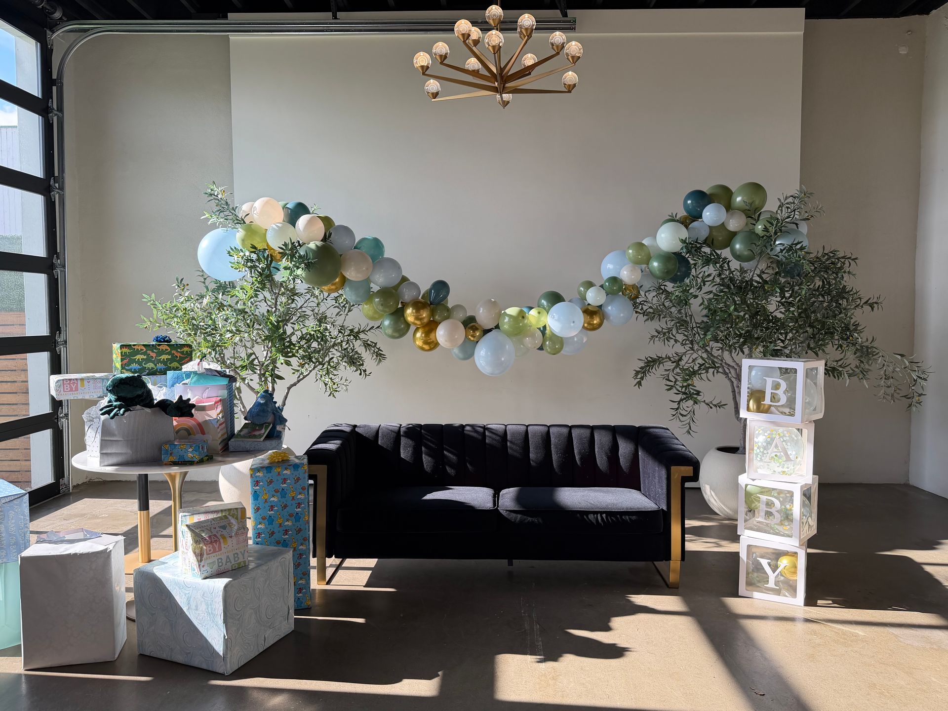 Balloons and decor set up for baby shower at Bestow Events in Longmont, CO.