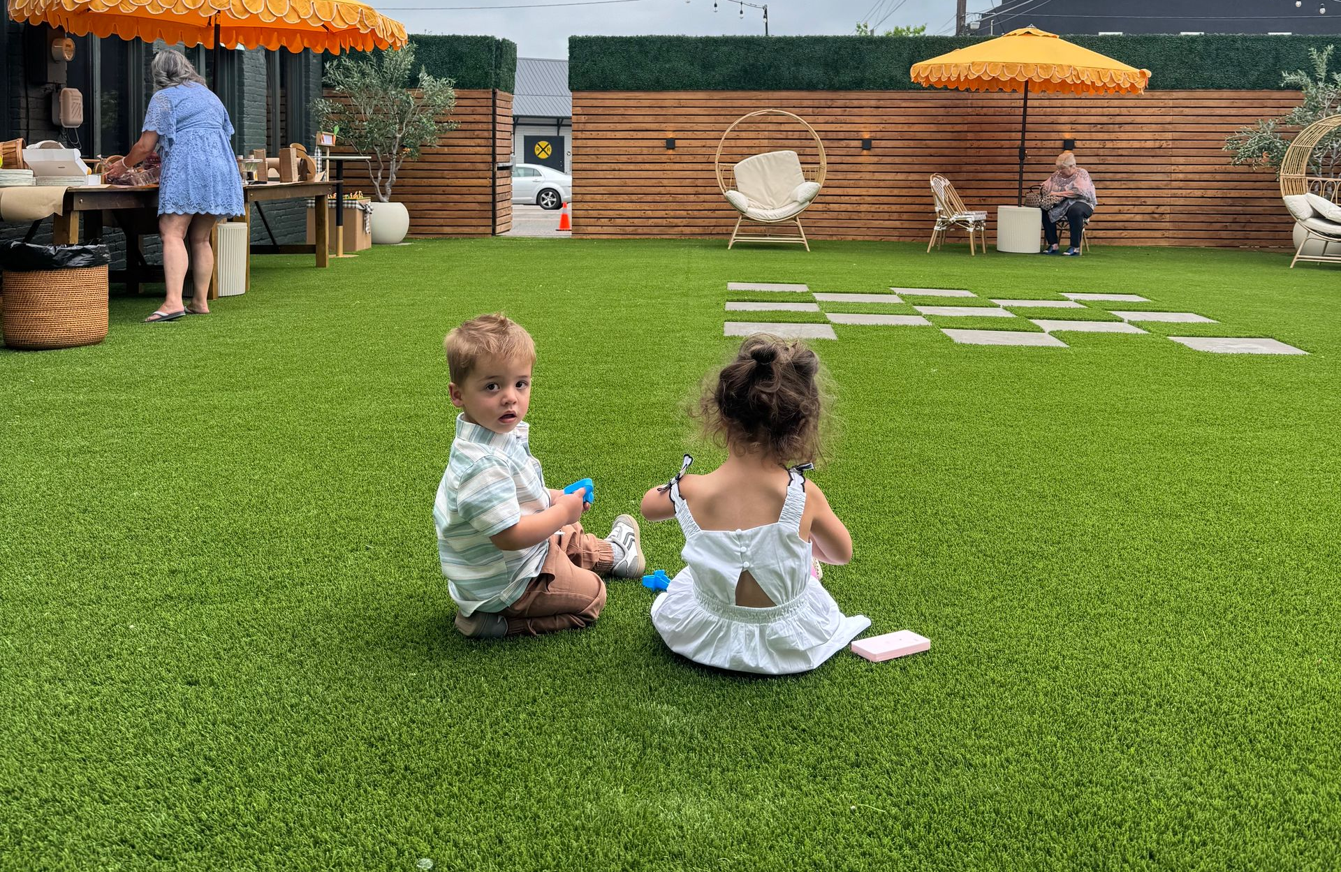 Kids enjoying the outdoor space for rent at Bestow Events in Longmont, CO.