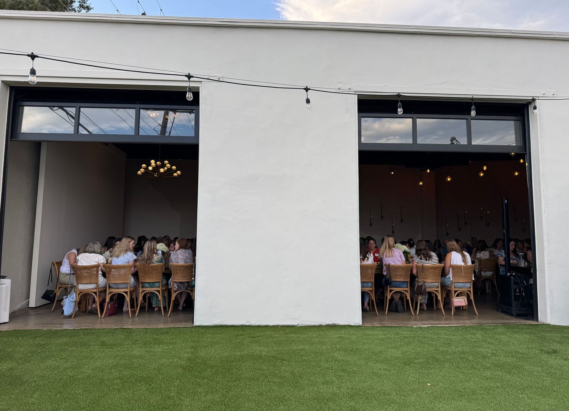 View of indoor reception space from outside area of Bestow Events in Longmont, CO.