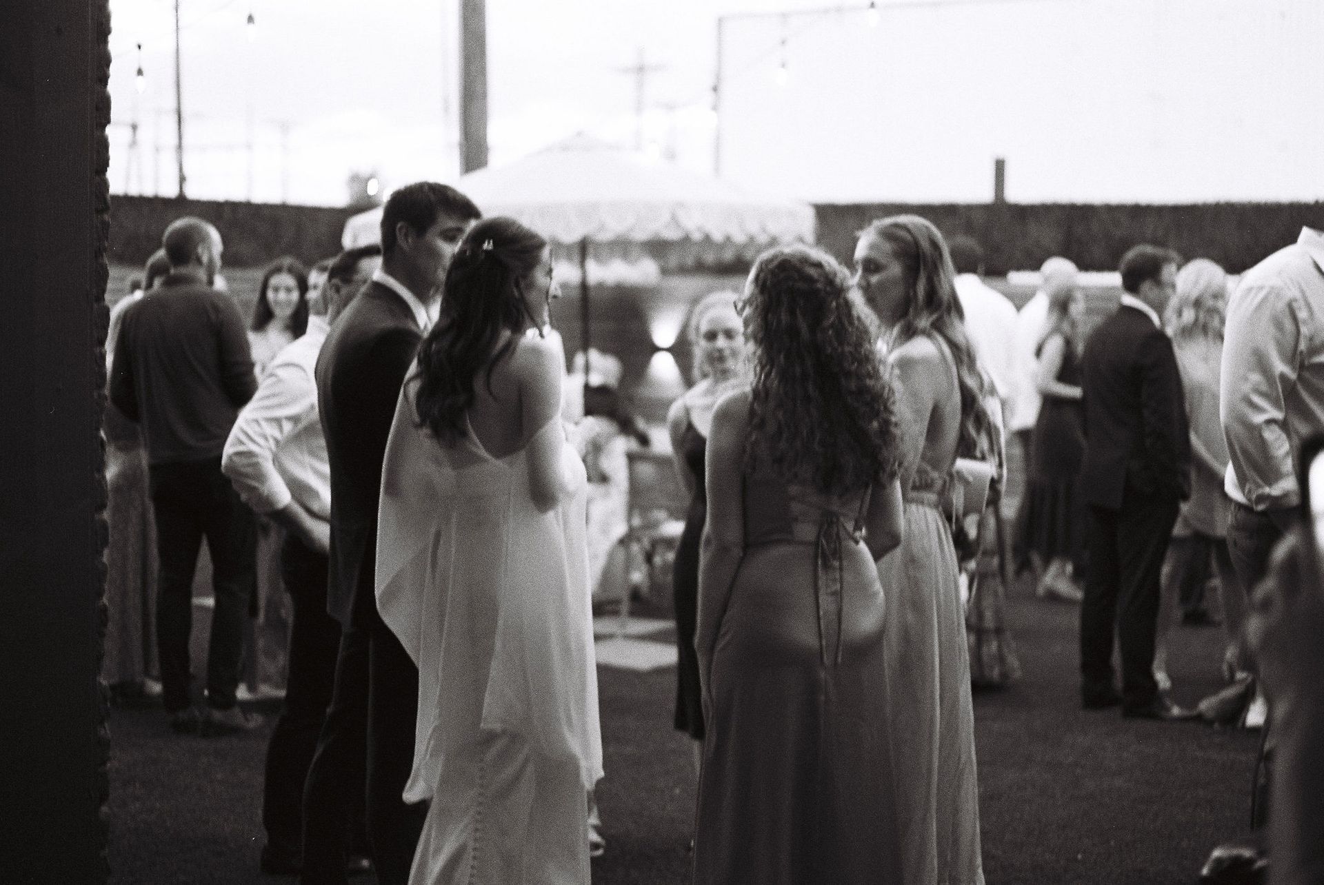Guests enjoying outdoor wedding reception at Bestow Events in Longmont, CO.