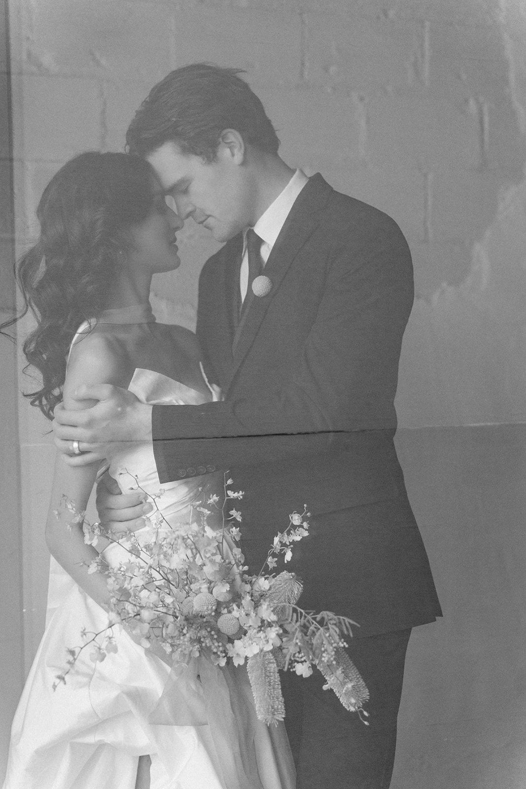 Bride and groom posing at Bestow Events in Longmont, CO.