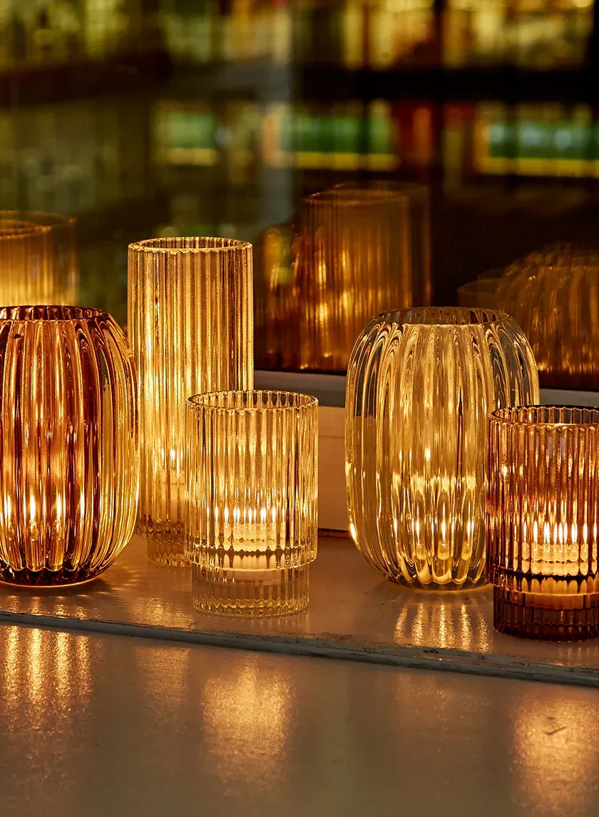 Modern glass votives at corporate event space for rent in Longmont, CO.