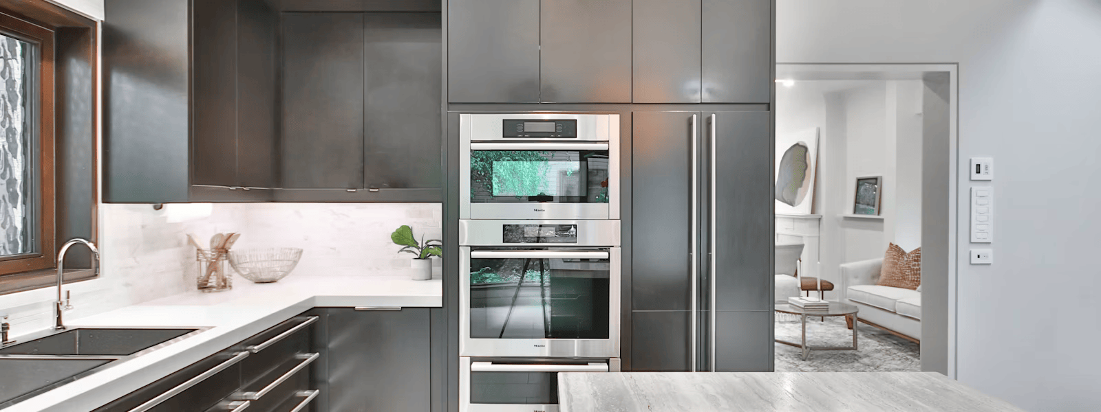 Fridge repair Fresno CA: modern kitchen with stainless steel refrigerator service