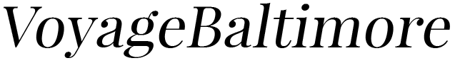 A black and white logo for voyage baltimore on a white background