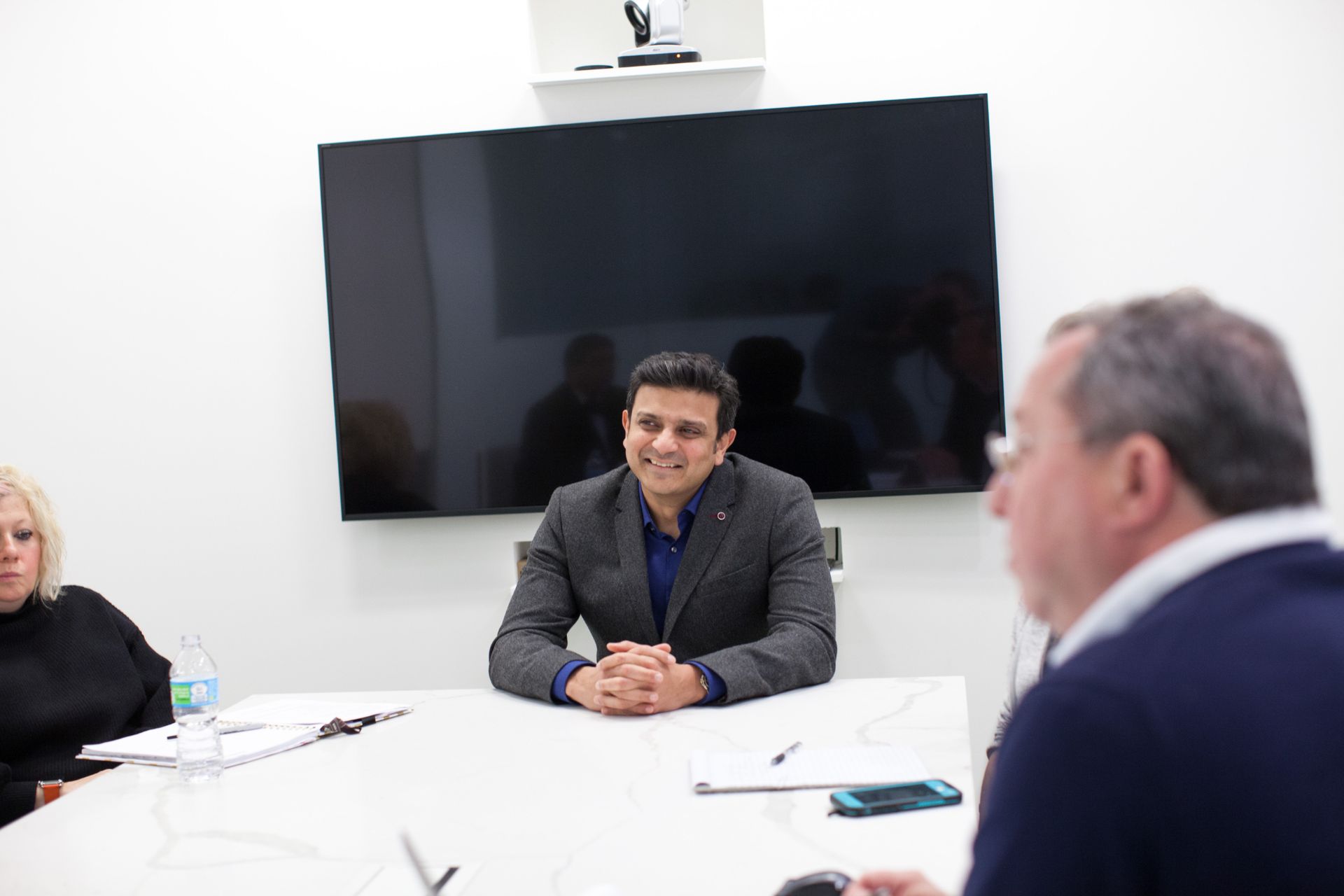 Dr. Swamy Venuturapalli and staff members during a meeting at Attune Health center for autoimmune and inflammation care in Los Angele