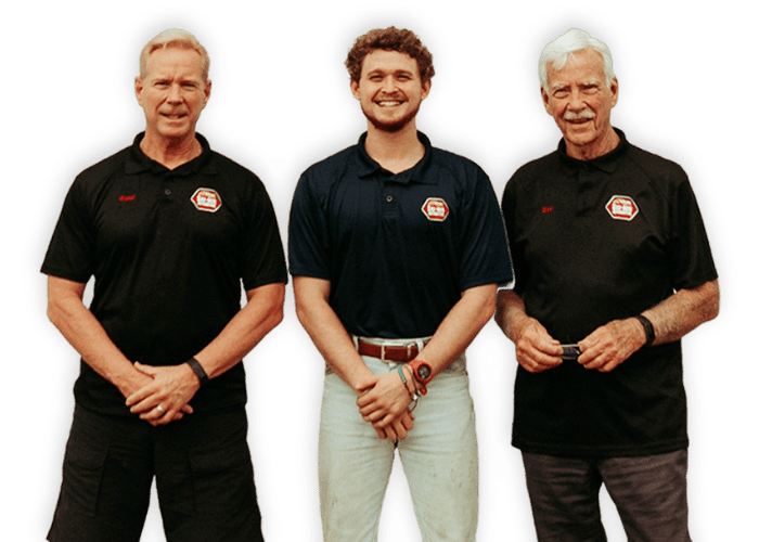 3 generations of Sav-Mor in black polo shirts standing side by side