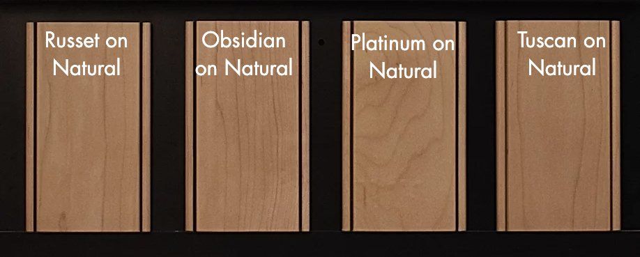 Four different types of wood are shown in a row