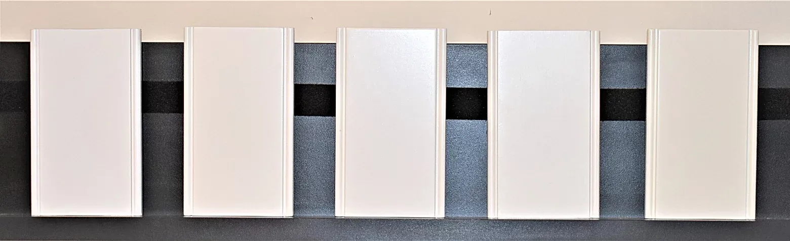 A row of white rectangles are lined up in a row