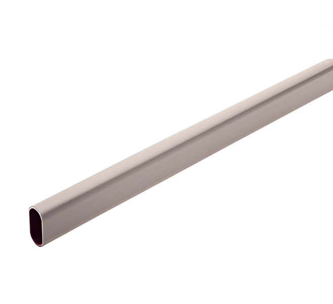 A long gray pipe is sitting on a white surface.