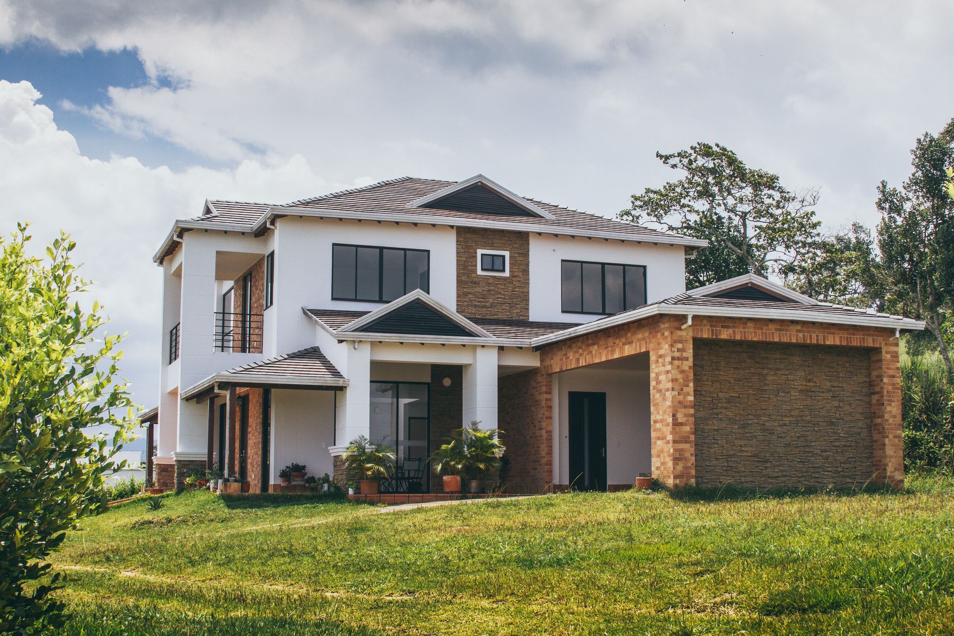 Two-story house with white walls