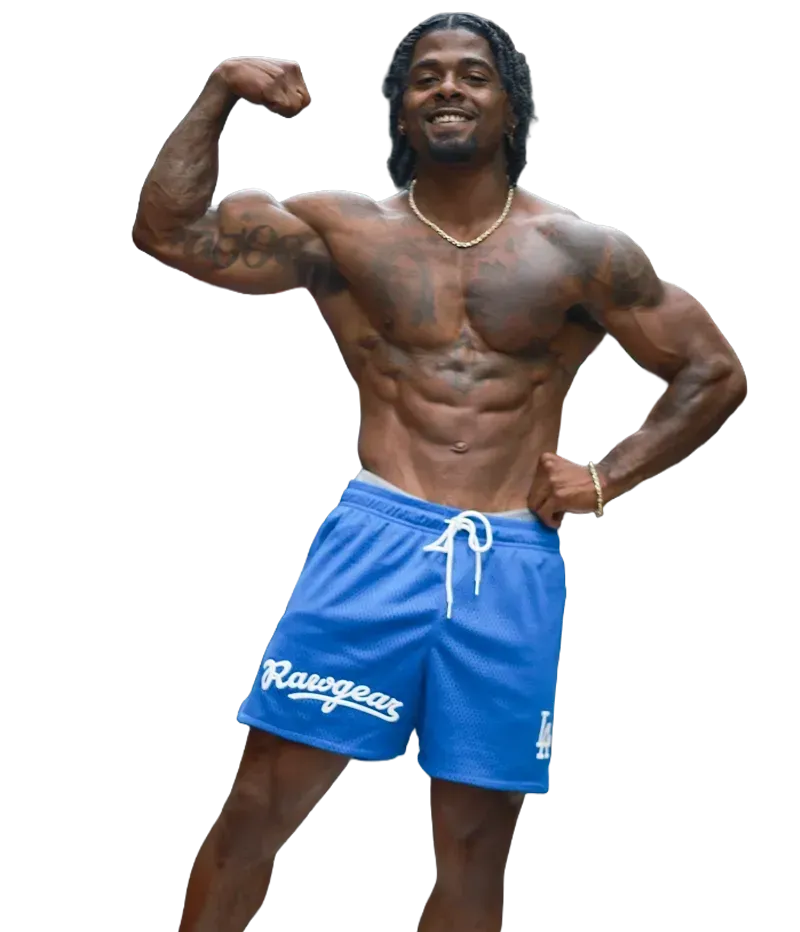 A man wearing blue shorts with the word rangers on them