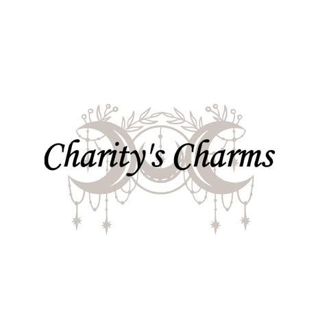“Charity’s Charms” logo with black script text and light gray jeweled earrings on white background