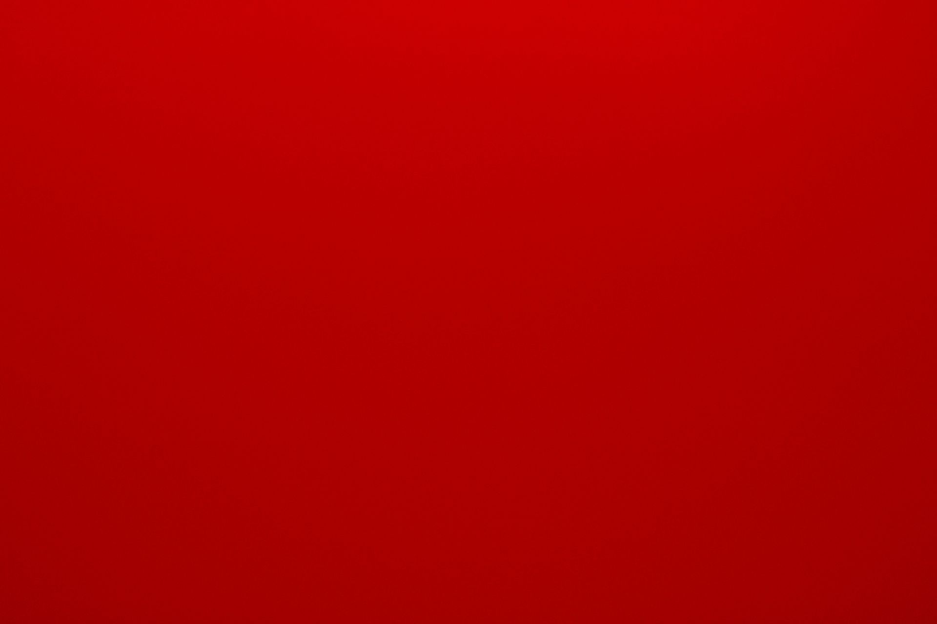 Solid red background with a slight gradient.
