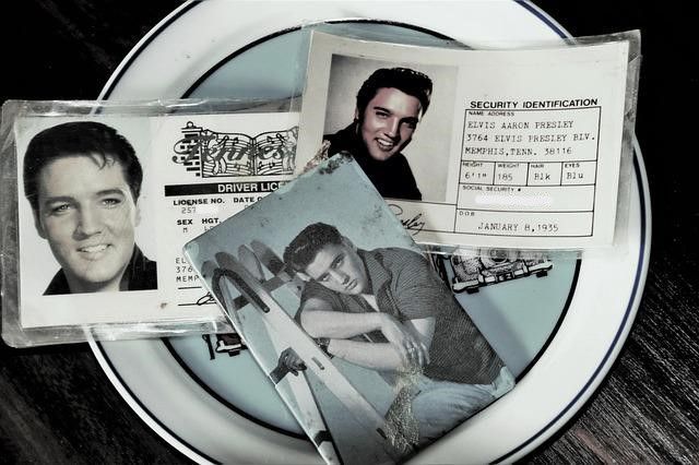 Three elvis presley memorabilia are on a plate