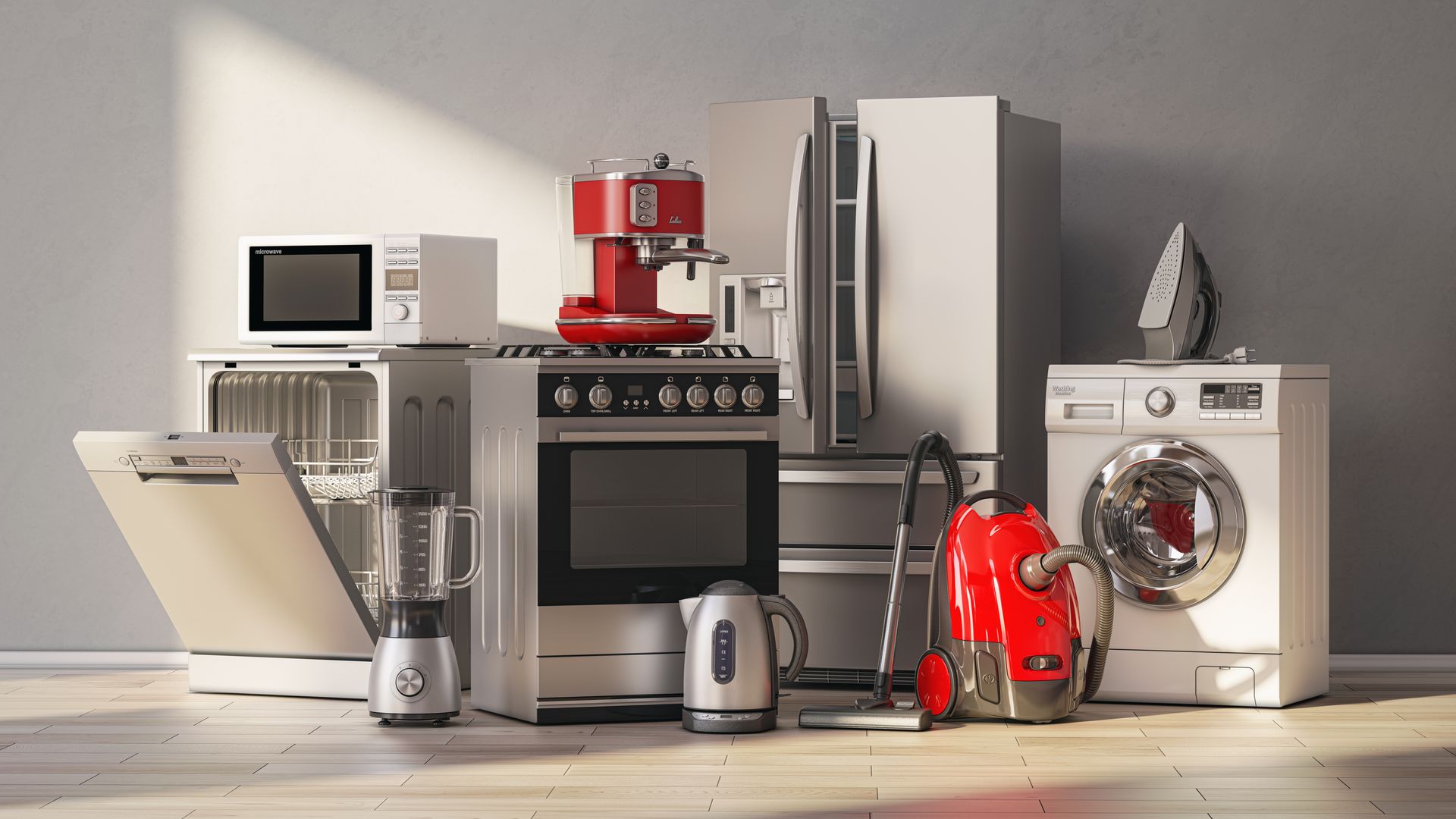 Kitchen appliances lined up on a countertop and floor, including stove, fridge, washer, microwave, and vacuum cleaner
