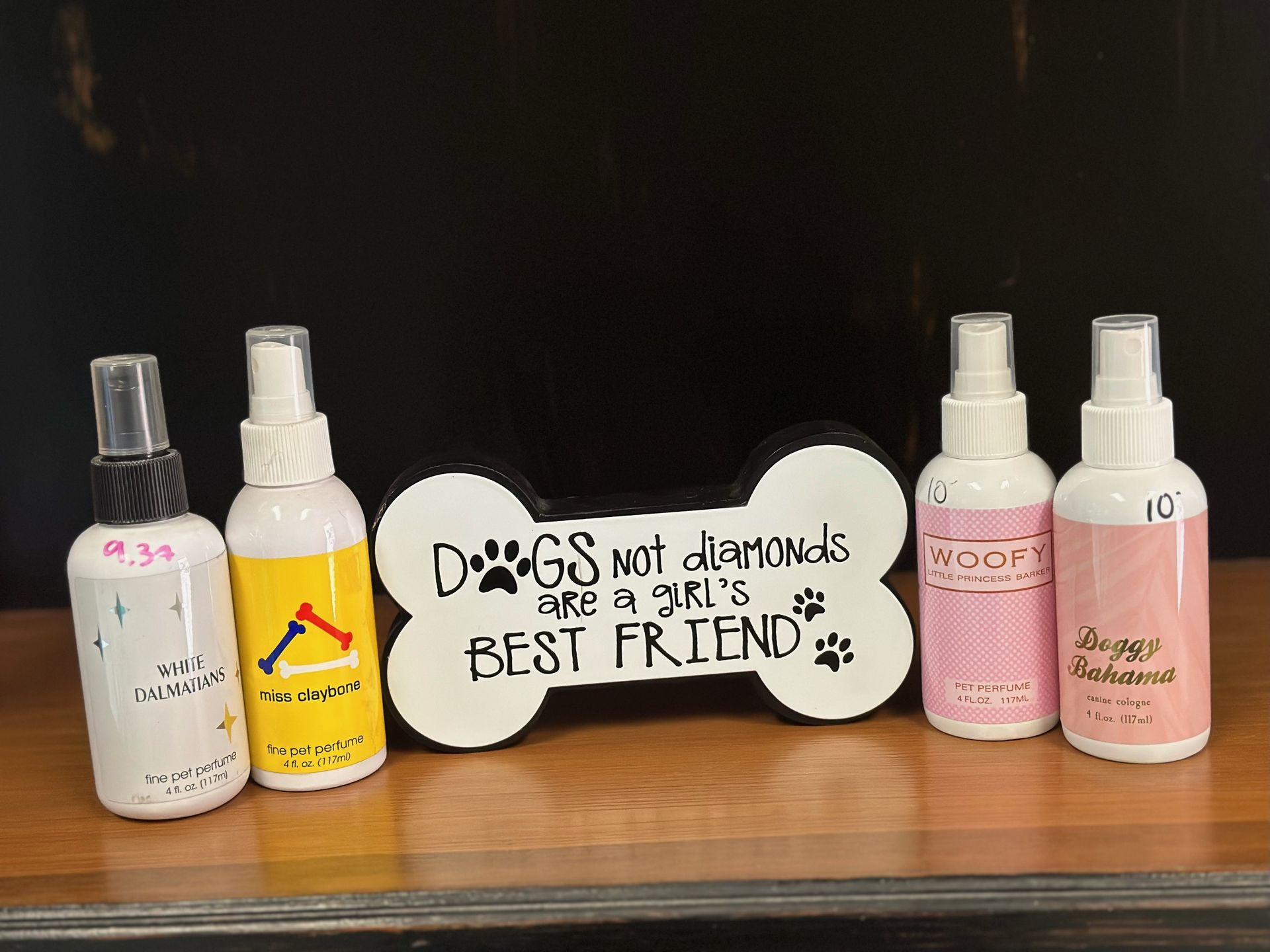 A sign that says dogs with diamonds are a girl 's best friend