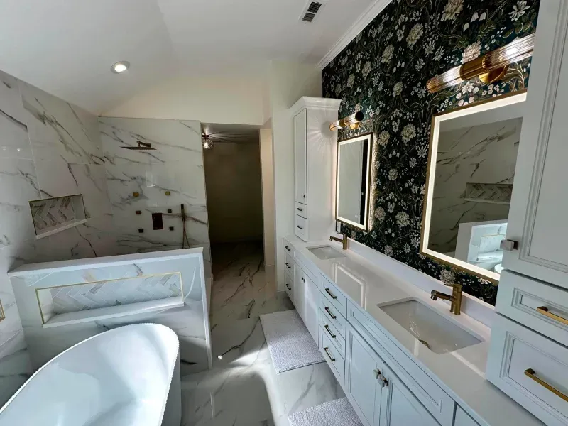 A bathroom with two sinks , two mirrors and a bathtub.