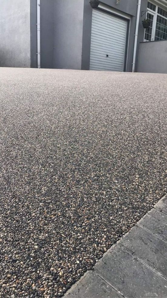 Domestic resin driveway installation in Exeter.