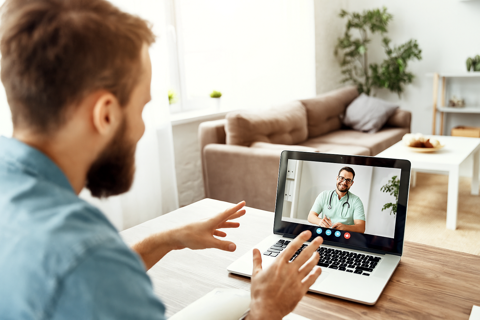 Man in his 30s meeting with a doctor online