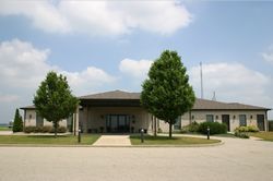 Exterior view of Mishler Funeral Home in Bremen, IN.