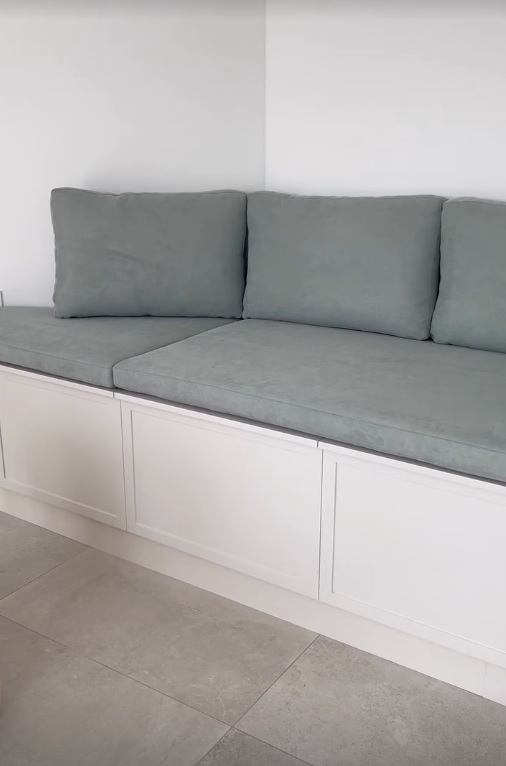 A Built In Couch With Sage Cushions — Metreson Upholstery In Unanderra, NSW