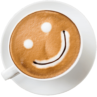 A cup of coffee with a smiley face drawn on it