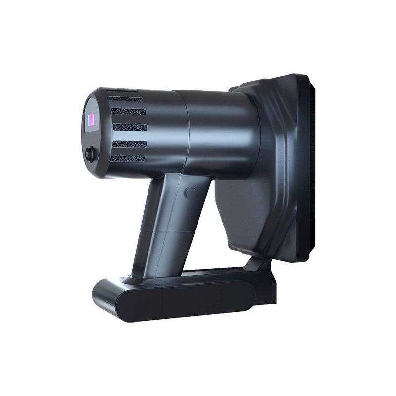A black vacuum cleaner is sitting on a white surface.
